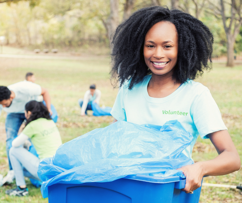 Woman volunteering in a community while full-time traveling